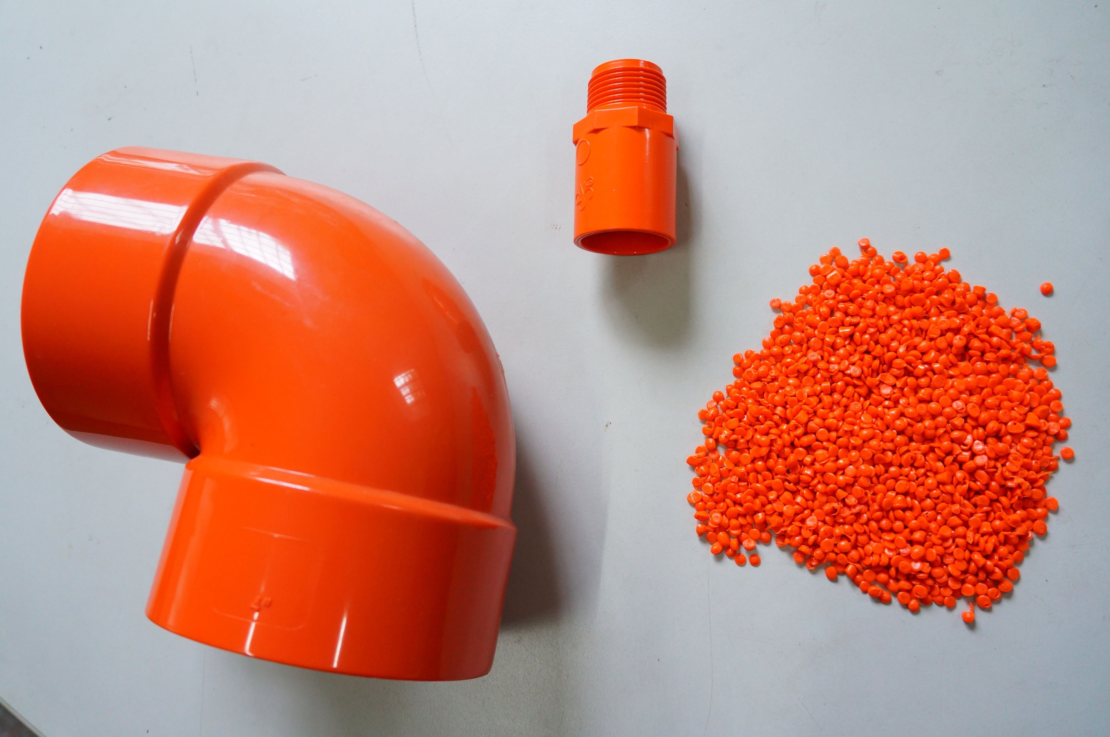 Orange uPVC compound and fitting samples