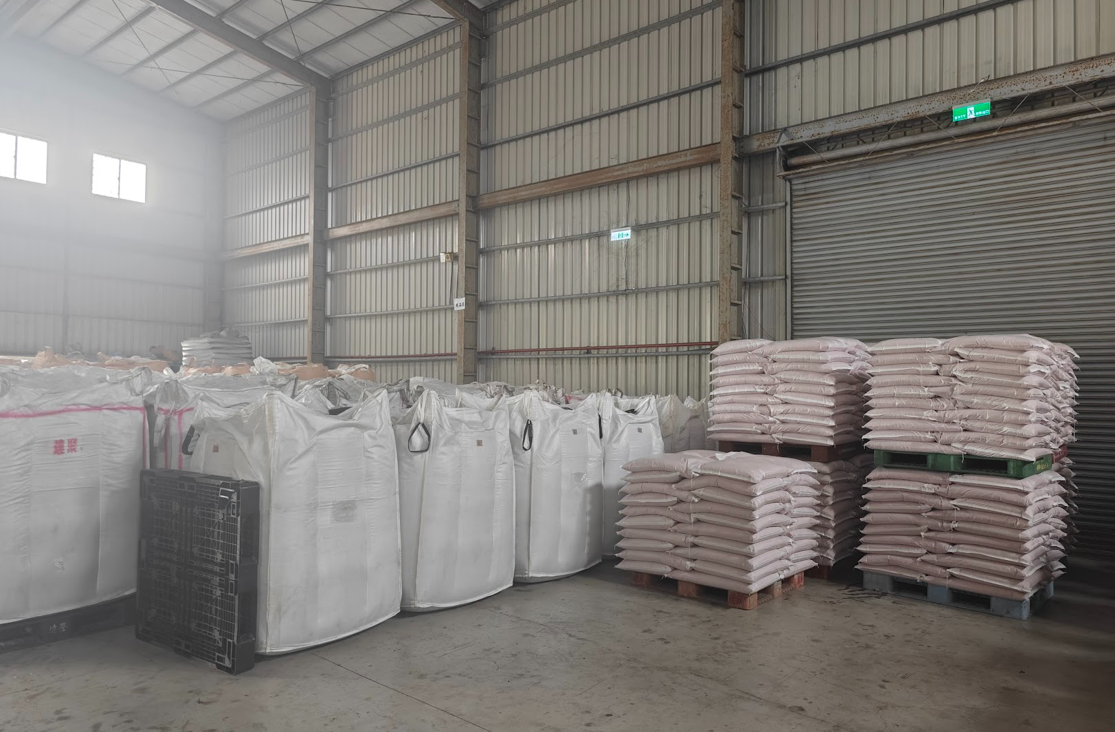Bagged recycled uPVC pellet inventory in warehouse